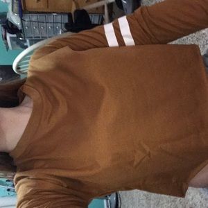 light orange sweater